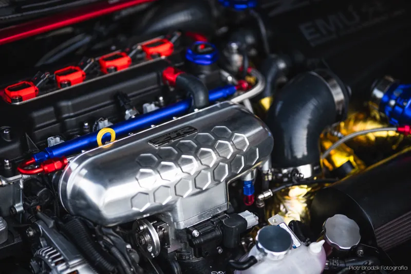 Engine bay — CNC-machined intake manifold