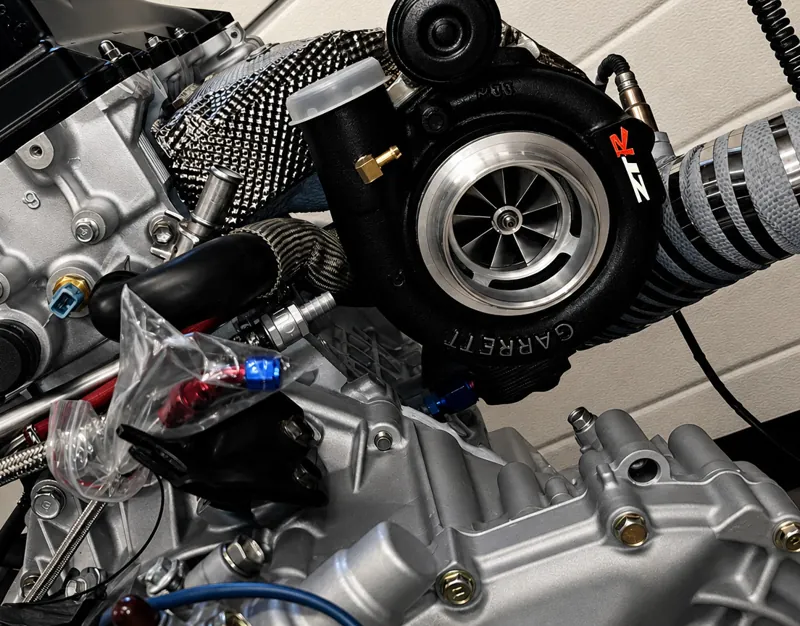 Turbocharger and exhaust-side assembly