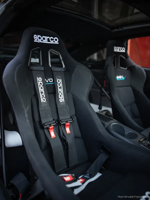 Sparco seats and four-point harnesses