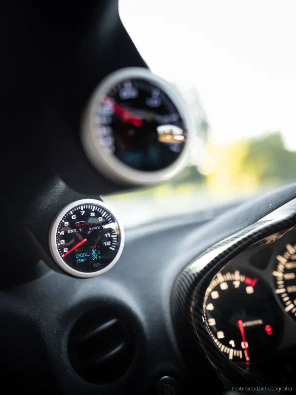 A-pillar engine-monitoring gauges